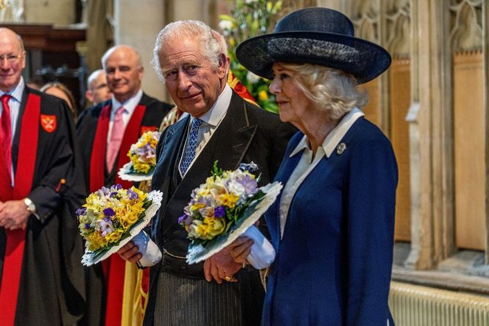 King Charles and Camilla in church
