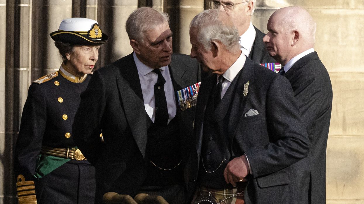 King Charles and Prince Andrew in discussion