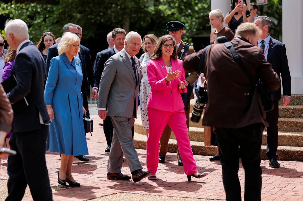 King Charles and Queen Camilla walk with Mayor of Front Royal Lori A. Cockrell