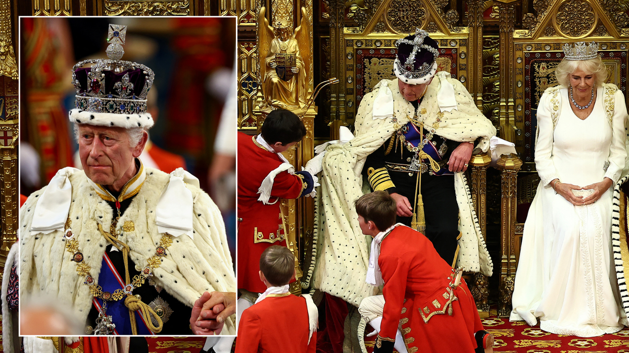 King Charles appears to snap at page boy who tried to adjust his robe