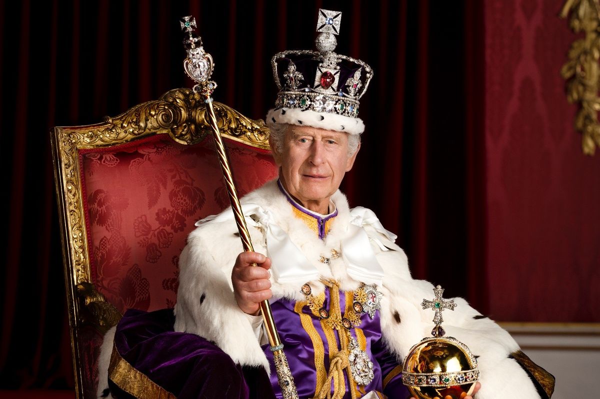 King Charles donned his crown and regalia for an individual snap in Buckingham Palace’s Throne Room