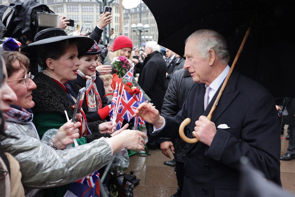King Charles greeting members of the public in Hamburg