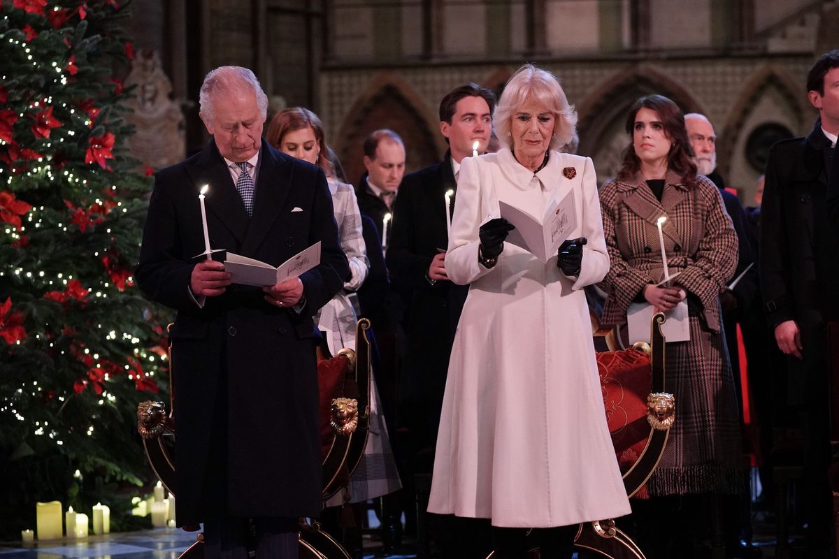 King Charles III and Camilla, Queen Consort are seen during the 'Together at Christmas' Carol Service at Westminster Abbey