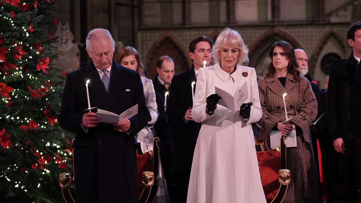 King Charles III and Camilla, Queen Consort are seen during the 'Together at Christmas' Carol Service at Westminster Abbey