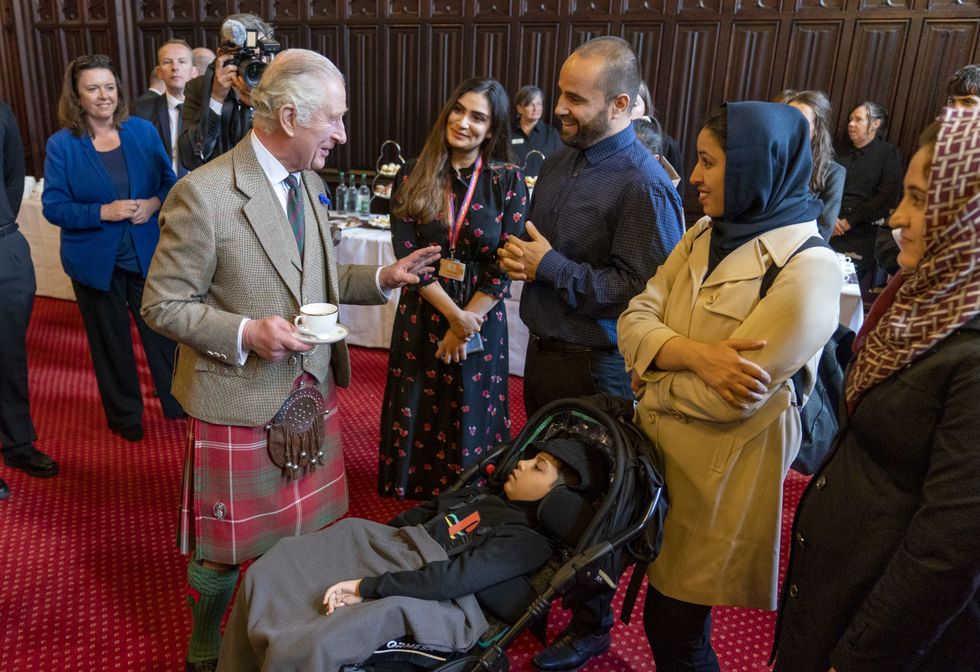 King Charles III during a visit to Aberdeen Town House to meet families who have settled in Aberdeen from Afghanistan, Syria and Ukraine. Picture date: Monday October 17, 2022.