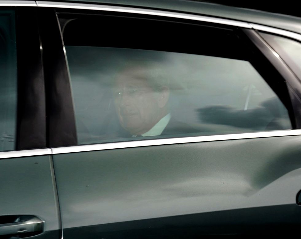 King Charles III is driven through Ballater as he leaves Birkhall in Scotland and travels to London following the death of Queen Elizabeth II on Thursday. Picture date: Friday September 9, 2022.