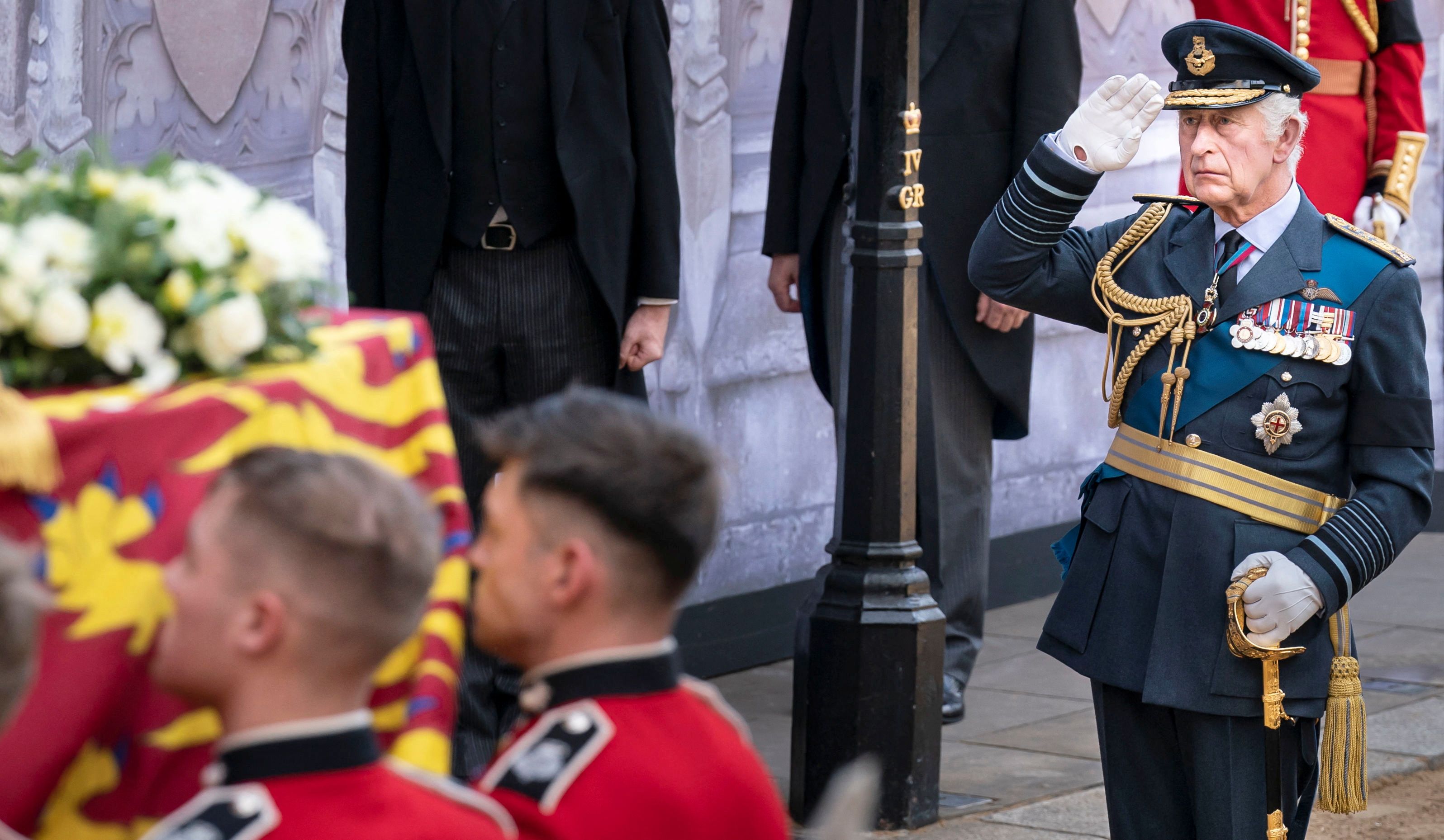King Charles III paying his respects to his late mother, Queen Elizabeth II