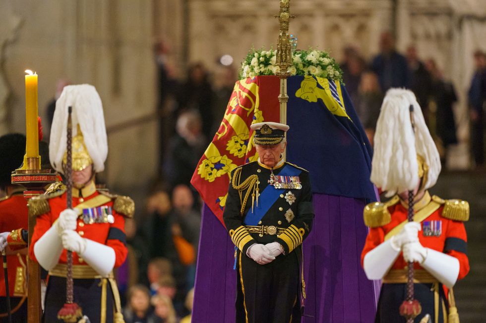 King Charles III, the Princess Royal, the Duke of York and the Earl of Wessex hold a vigil beside the coffin of their mother, Queen Elizabeth II, as it lies in state on the catafalque in Westminster Hall, at the Palace of Westminster, London.  September 16, 2022. Dominic Lipinski/Pool via REUTERS