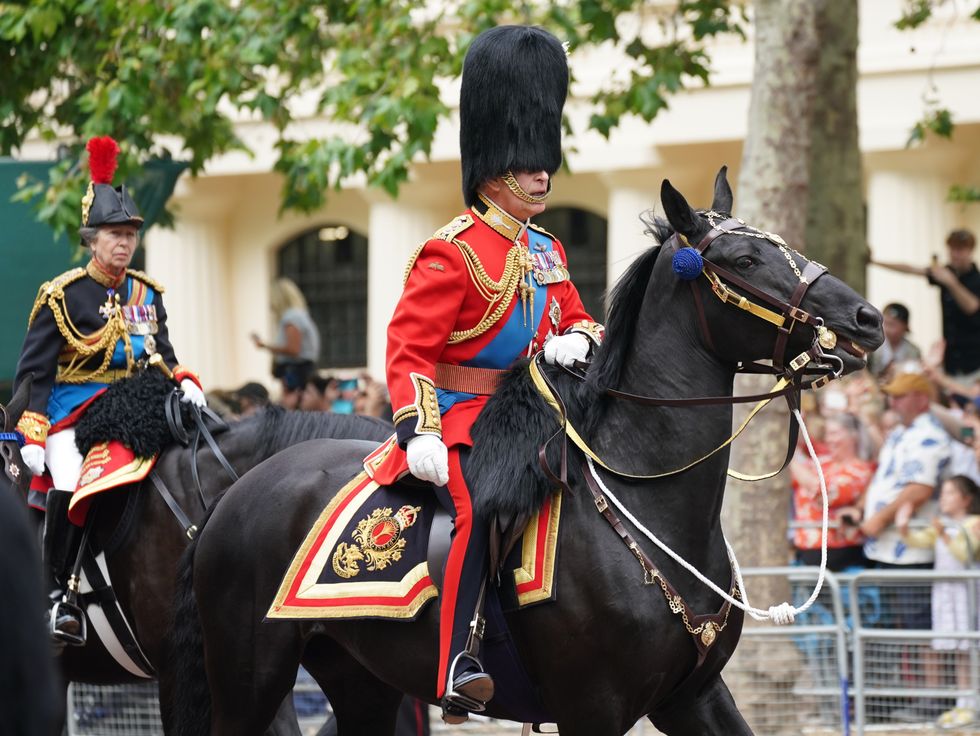 King Charles III travels along The Mall to the Trooping the Colour ceremony