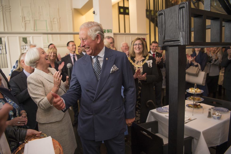King Charles laughed off a waiter bumping into him whilst on an outing in a London pub.