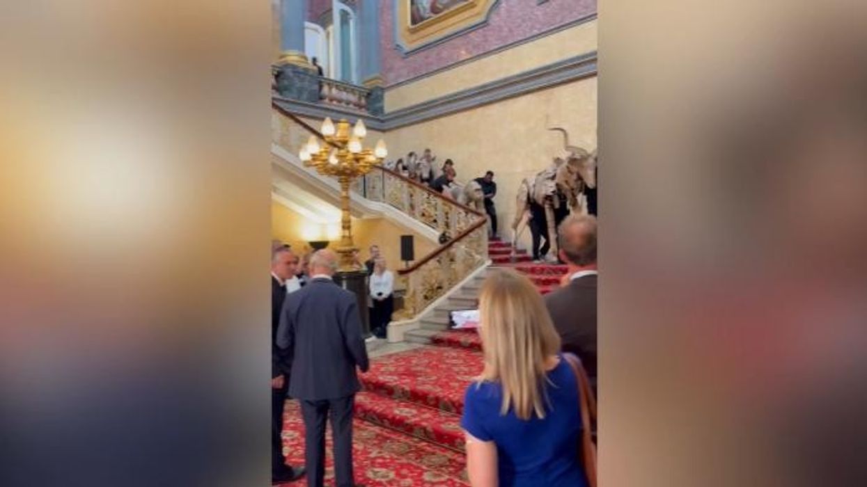 King Charles rubs shoulders with George and Amal Clooney at Buckingham Palace