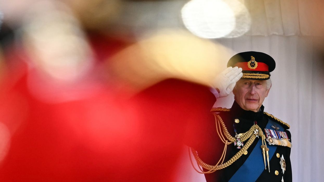 King Charles salutes