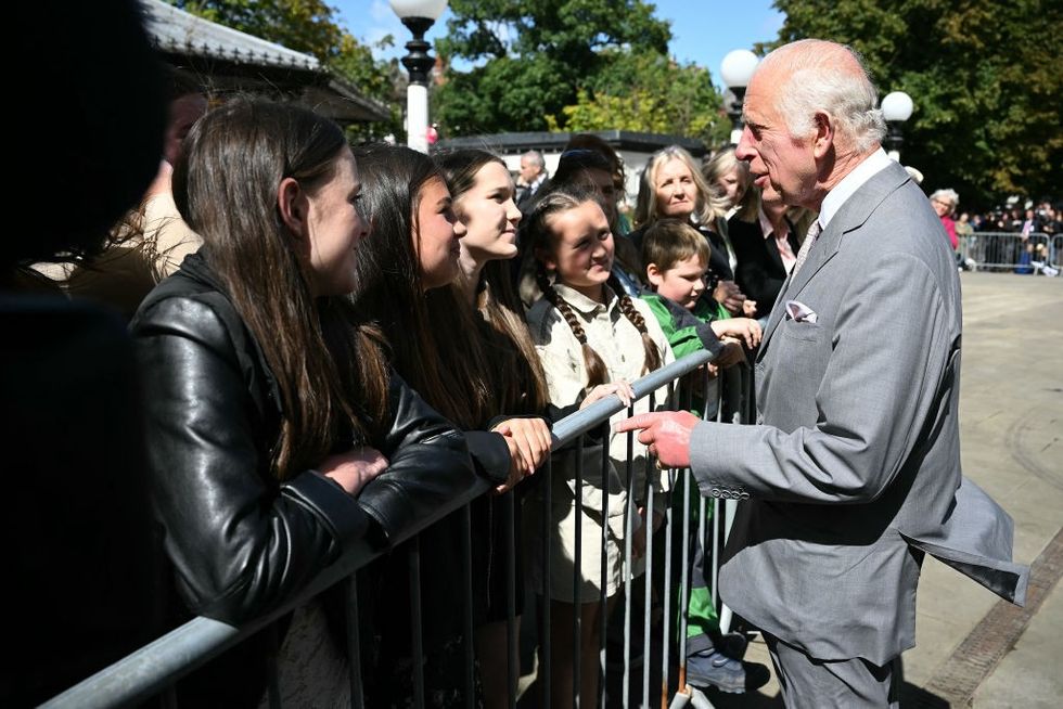 King Charles speaking to fans