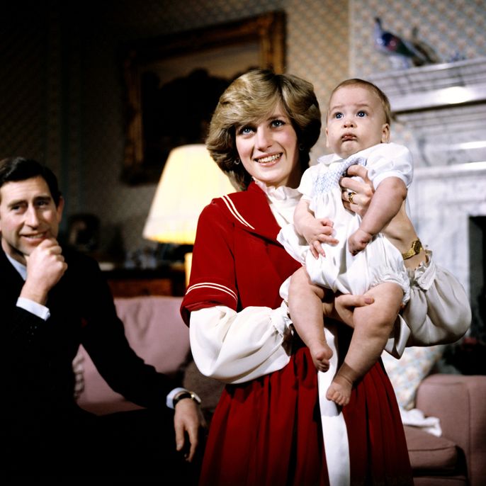 King Charles, then Prince of Wales, and Princess Diana at Kensington Palace with their baby son Prince William.