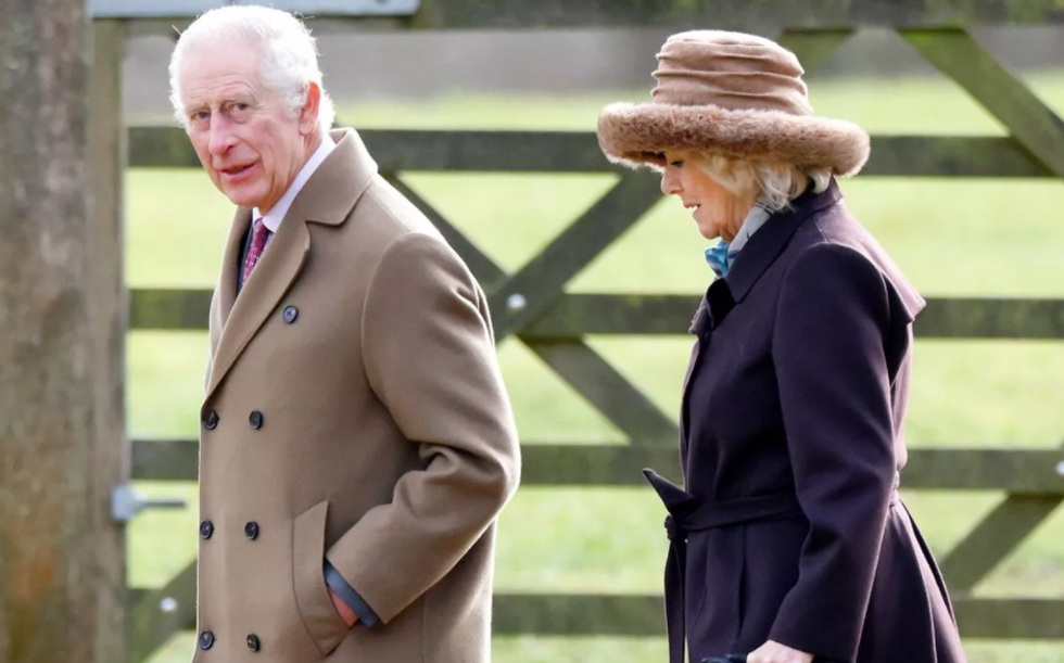 King Charles walking with Queen Camilla
