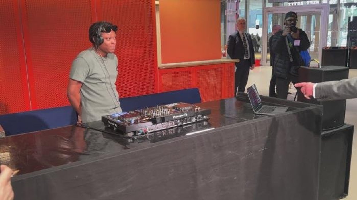 King Charles sways to the music as he takes over DJ decks in Manchester