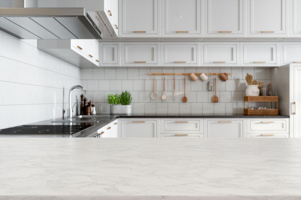 Kitchen with white cupboards