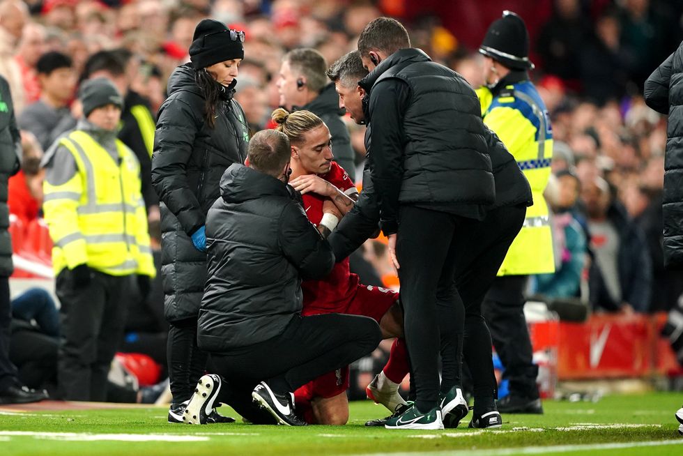 Kostas Tsimikas was forced off with injury