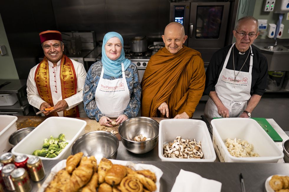 Krishan Kant Attri, Julie Siddiqi, Venerable Ajahn Amaro and the Archbishop of Canterbury Justin Welby take part in the Big Help Out in London in April 2023