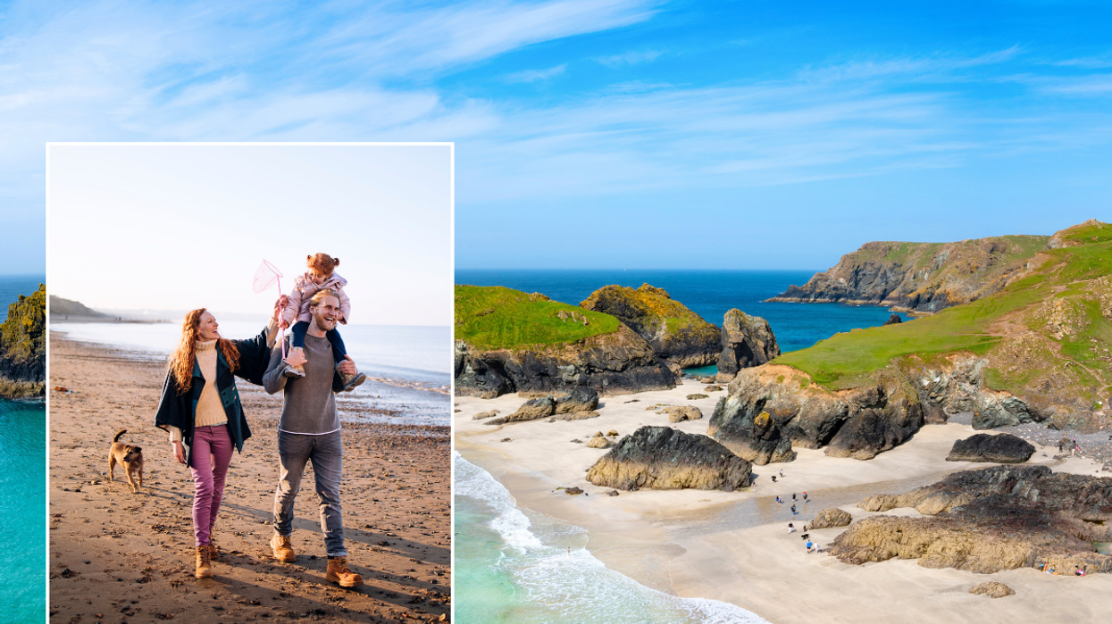 Kynance Cove beach / family walking on beach