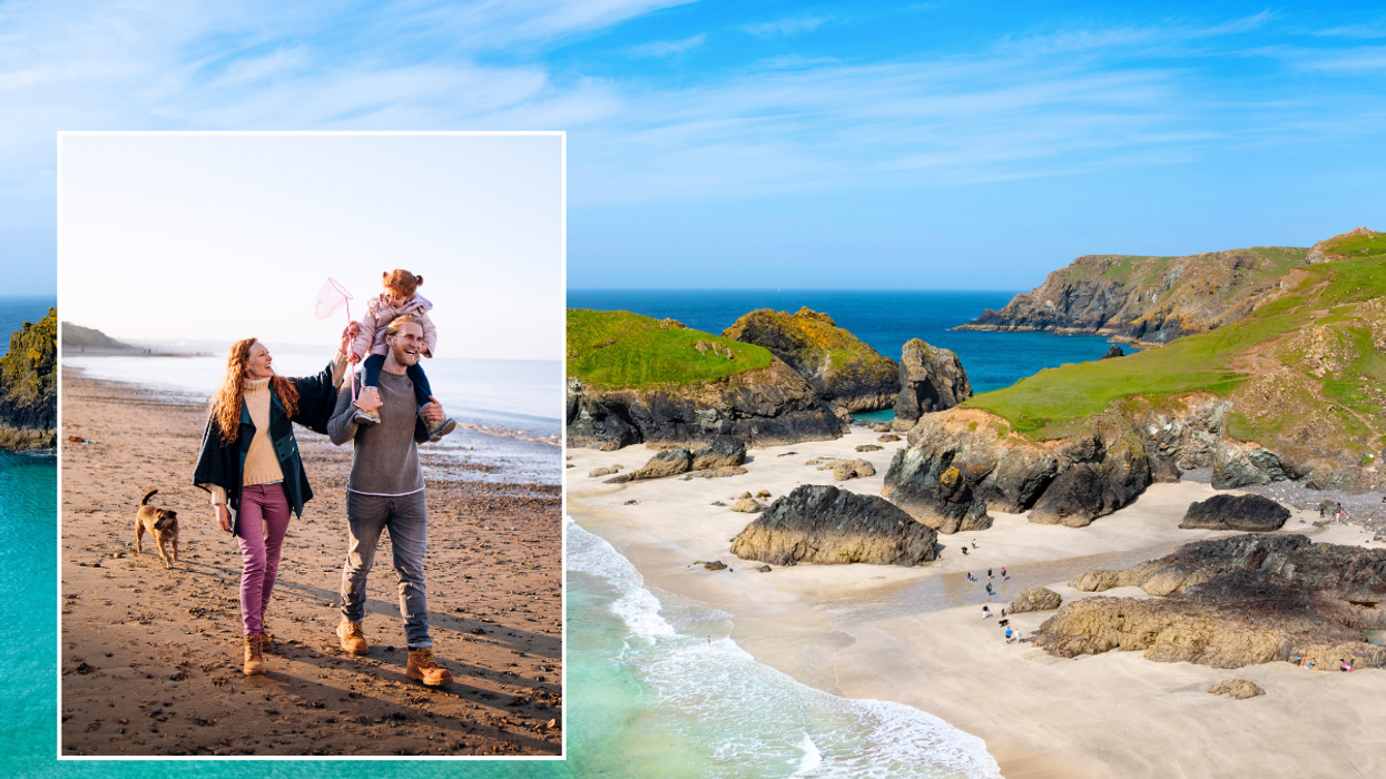 Kynance Cove beach / family walking on beach