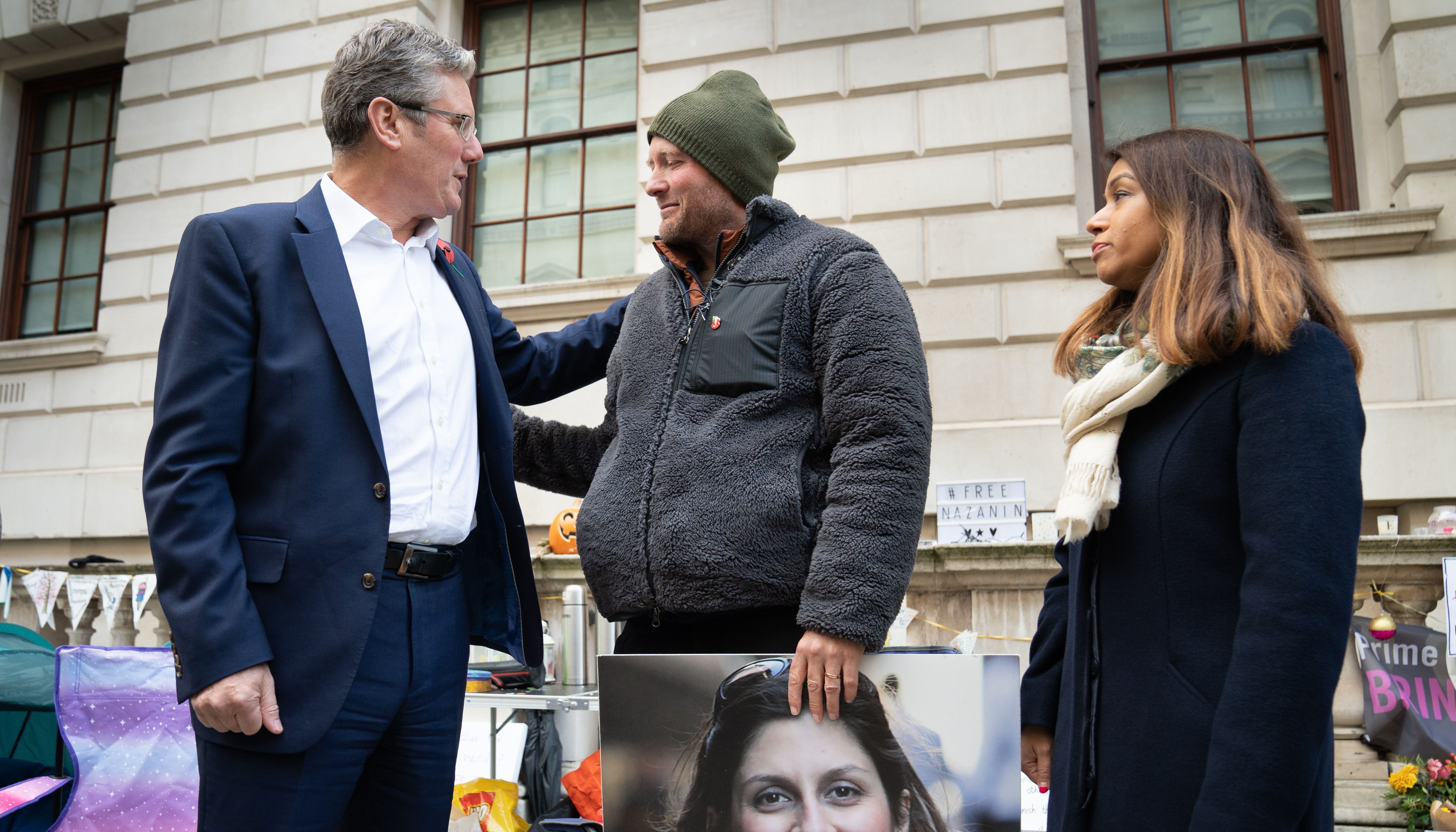 Labour leader Keir Starmer (left) and Labour M.P. Tulip Siddiq (far right) meet with Richard Ratcliffe, the husband of Iranian detainee Nazanin Zaghari-Ratcliffe, outside the Foreign Office in London.
