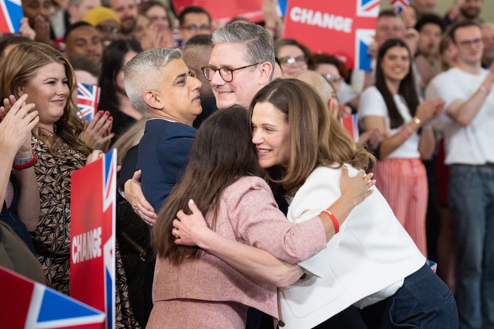 Labour leader Sir Keir Starmer and his wife Victoria Starmer greet Mayor of London Sadiq Khan at a watch party for the results of the 2024 General Election in central London