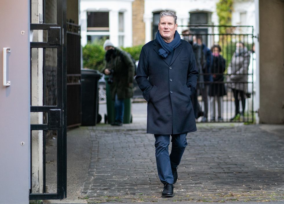 Labour leader Sir Keir Starmer arrives to receive his Covid booster vaccination at a pharmacy in London. Picture date: Monday December 6, 2021.