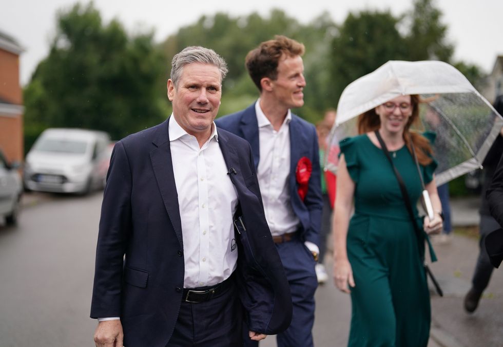 Labour leader Sir Keir Starmer (left) and deputy Labour Party leader Angela Rayner with Labour candidate Alistair Strathern (centre) during a visit to Shefford in the constituency of Mid Bedfordshire