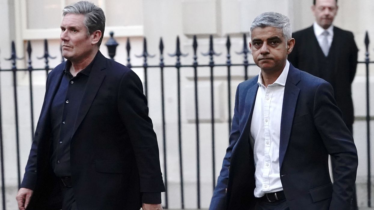 Labour leader Sir Keir Starmer (left) and Mayor of London Sadiq Khan leave the Rupert and Lachlan Murdoch annual party at Spencer House, St James' Place in London