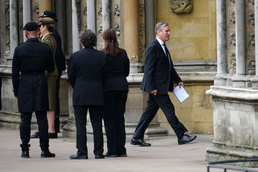 Labour leader Sir Keir Starmer (right) arriving at the State Funeral of Queen Elizabeth II, held at Westminster Abbey, London. Picture date: Monday September 19, 2022.
