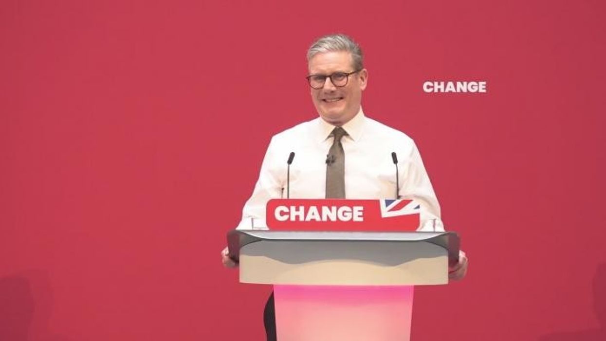 WATCH: Keir Starmer HALTS speech as heckler is bundled out