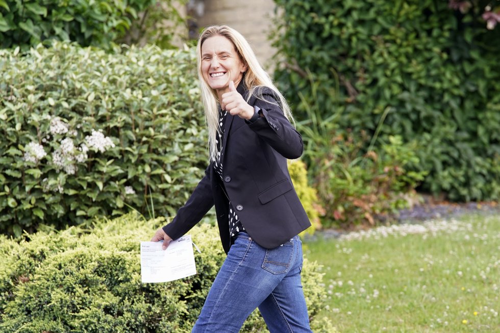 Labour party candidate Kim Leadbeater leaves Norristhorpe United Reformed Church polling station after casting her vote in the West Yorkshire constituency by-election at Batley and Spen which her older sister, Jo Cox, represented before she was killed by a far-right terrorist in 2016.