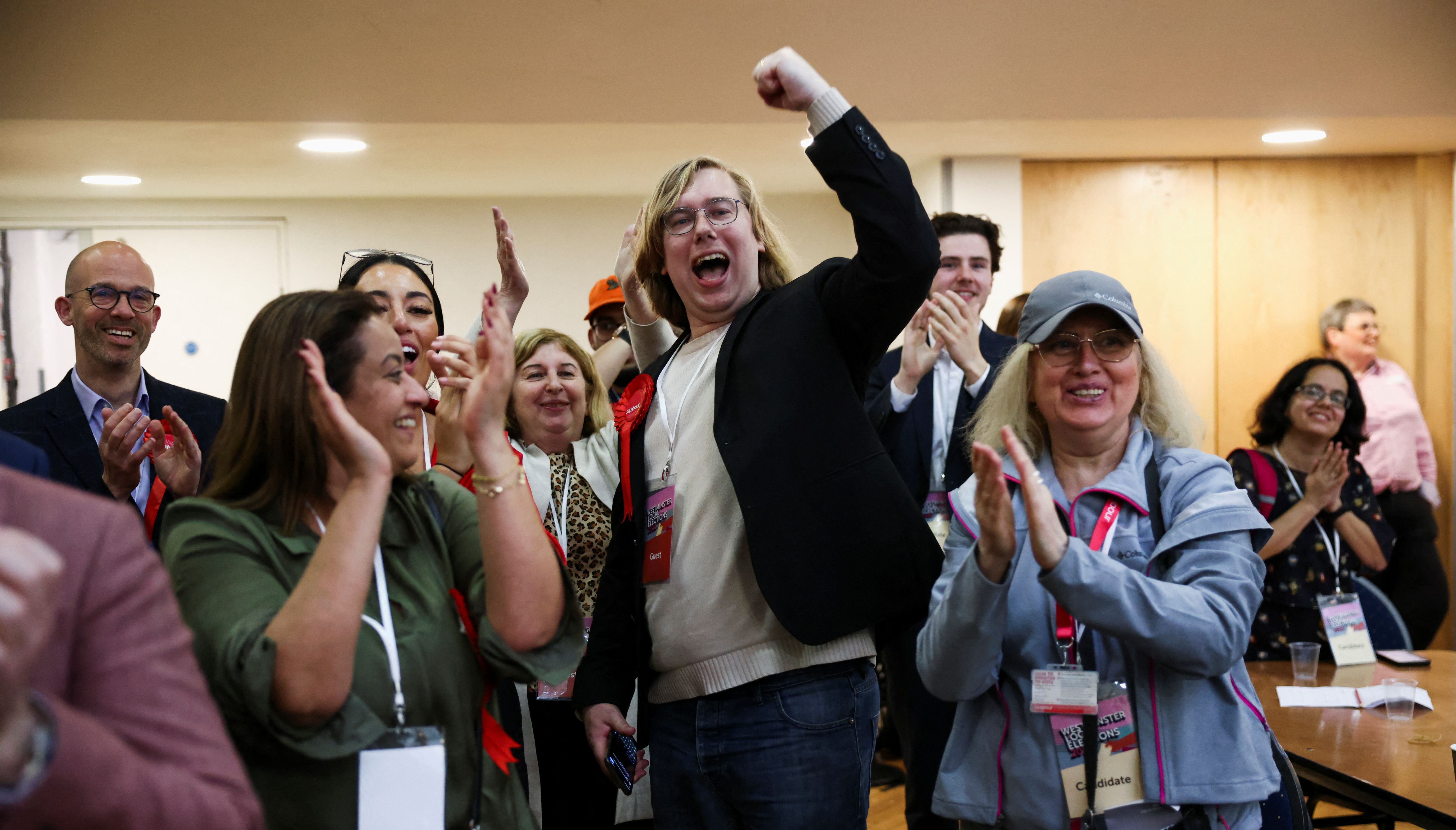 Labour Party candidates and supporters celebrate after the Labour gain of Westminster City Council
