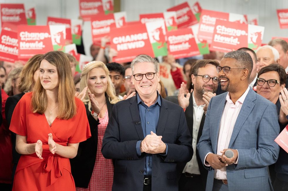 Labour Party leader Sir Keir Starmer with First Minister of Wales Vaughan Gething (right) and local parliamentary candidate for Carmarthenshire, Martha O'Neil