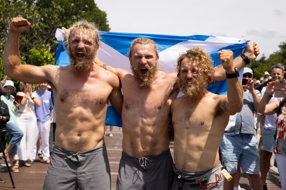 Lachlan, Jamie and Ewan celebrate their world record