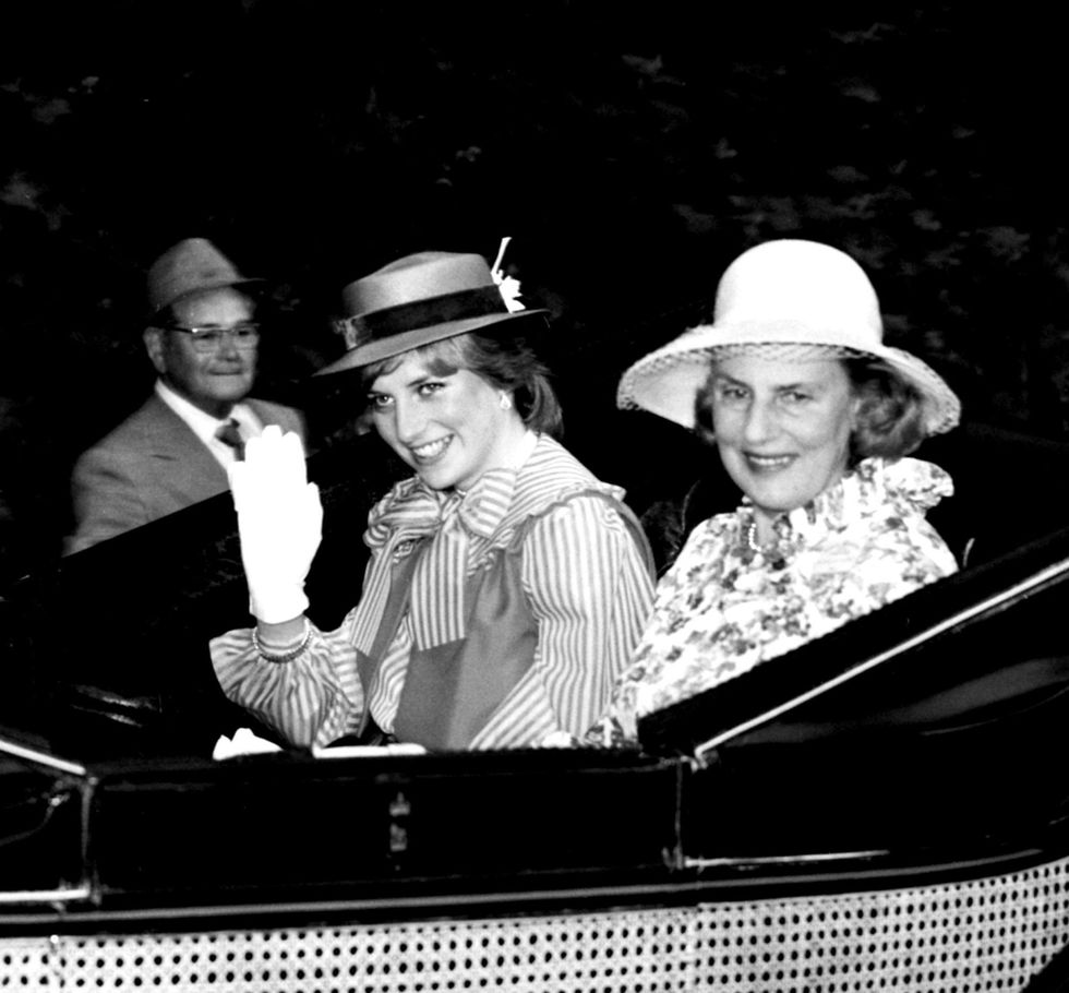 Lady Diana Spencer, fiancee of the Prince of Wales, rides in a carriage with the Duchess of Grafton (right), down the course at Royal Ascot on Ladies' Day in 1981.
