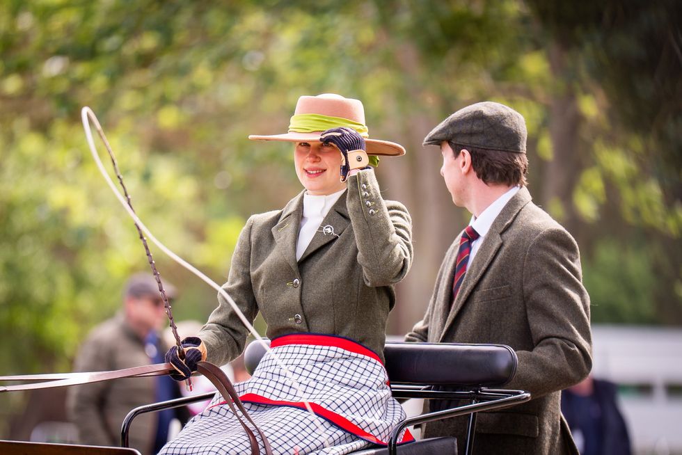 Lady Louise Windsor drives a carriage during the Royal Windsor Horse Show