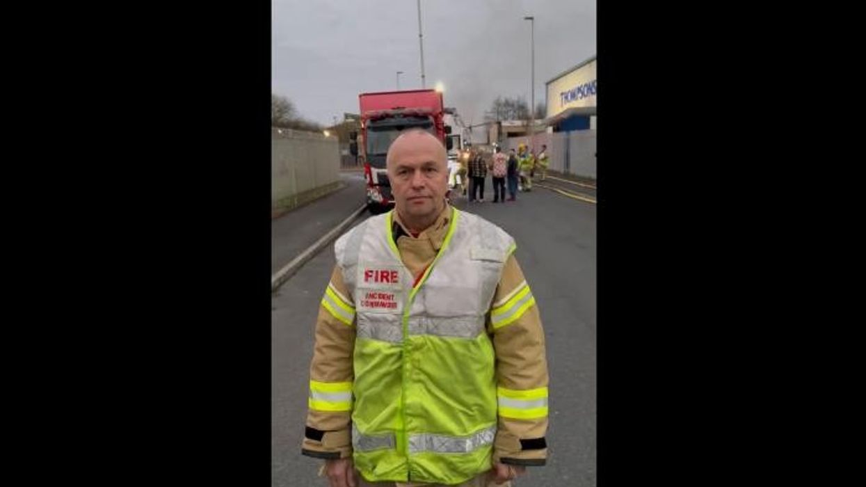 Six people in hospital after huge fire engulfs industrial estate as 'emergency response' mobilised