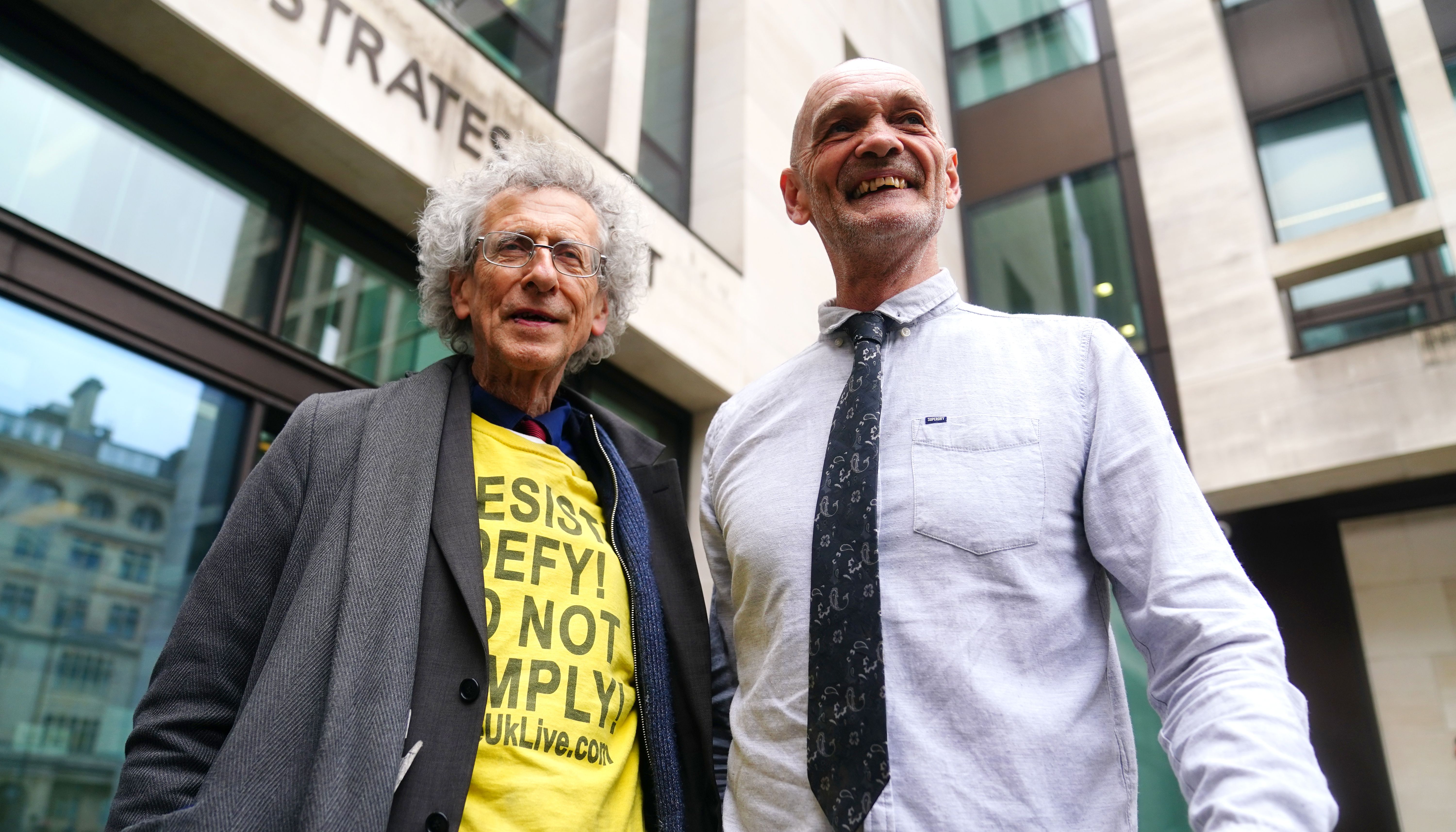 Lance O'Connor with Piers Corbyn outside Westminster Magistrates' Court, London