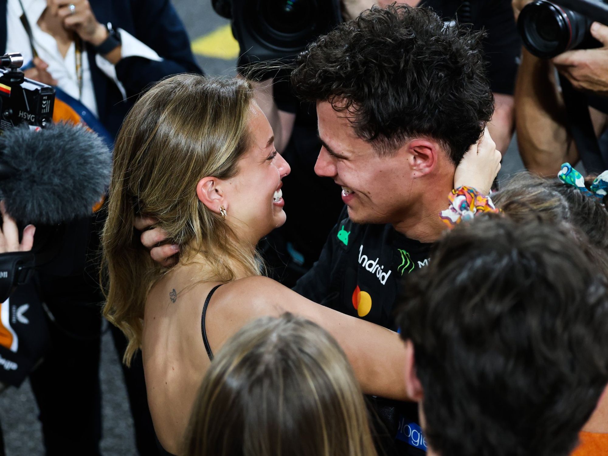 Lando Norris embraced his model girlfriend Magui Corceiro