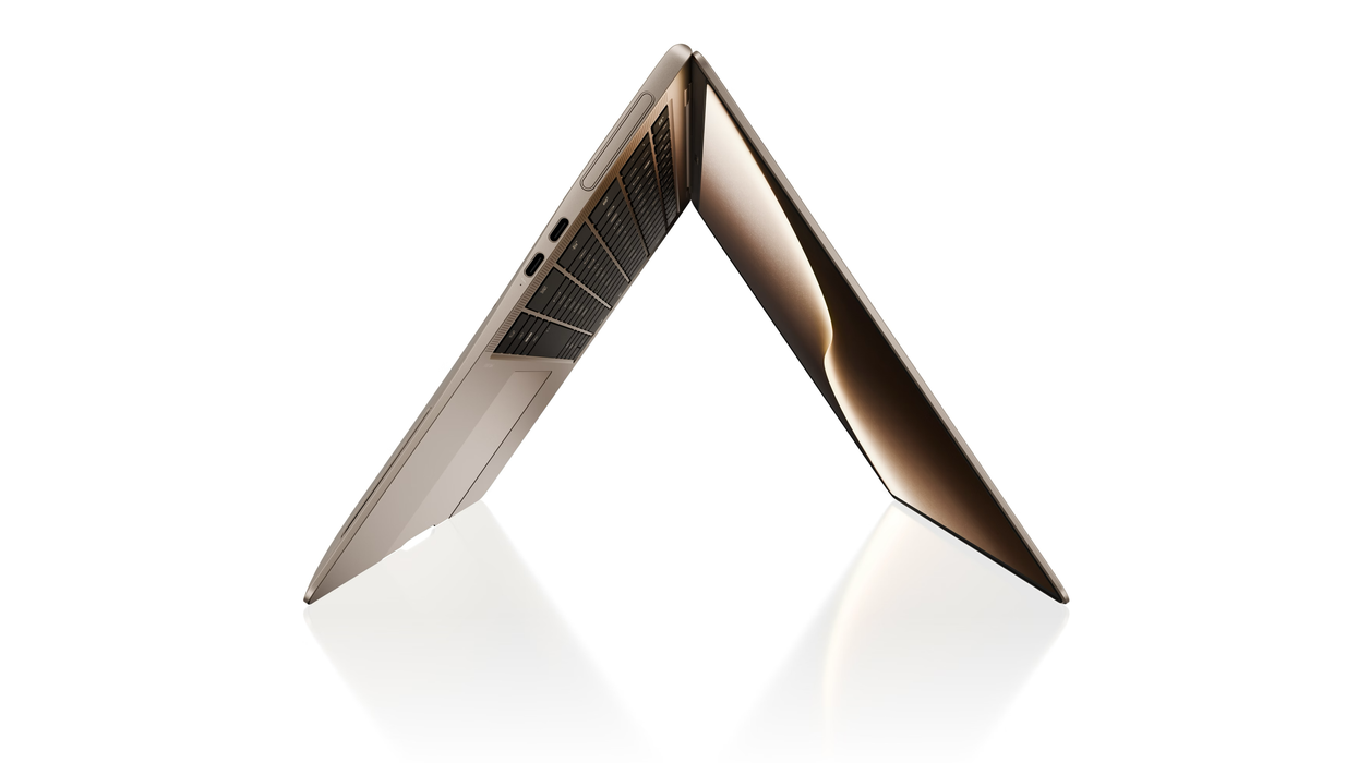 laptop pictured on its side on a white background