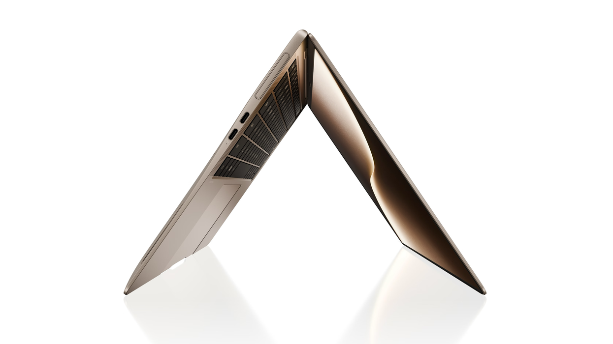 laptop pictured on its side on a white background