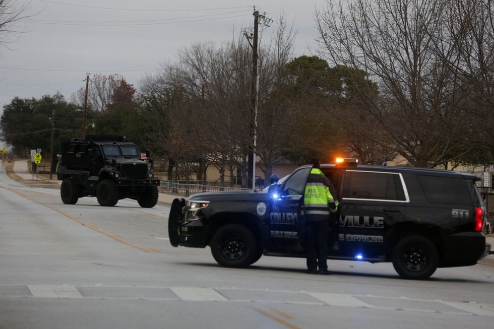 Law enforcement vehicles in Colleyville, Texas, U.S. January 15, 2022.