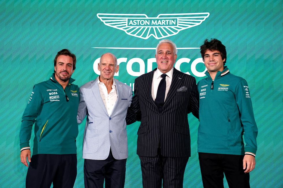 Lawrence Stroll with Aston Martin's F1 drivers