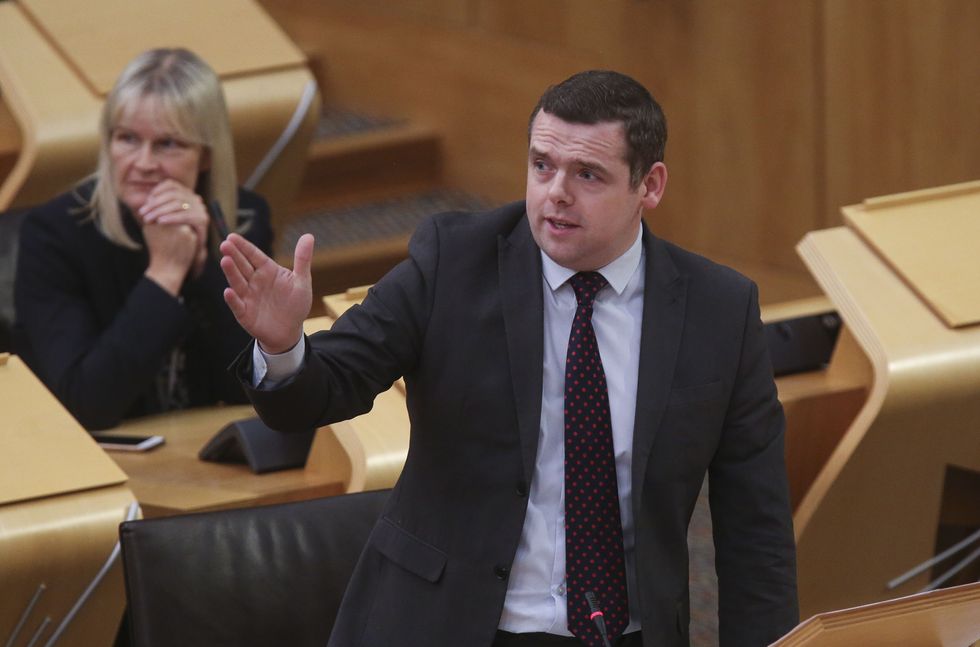 Leader of the Scottish Conservatives Douglas Ross during an update to MSPs on changes to the Covid-19 restrictions, at the Scottish Parliament in Holyrood.