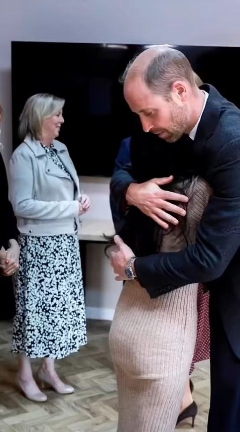 Leanne Lucas hugging Prince William