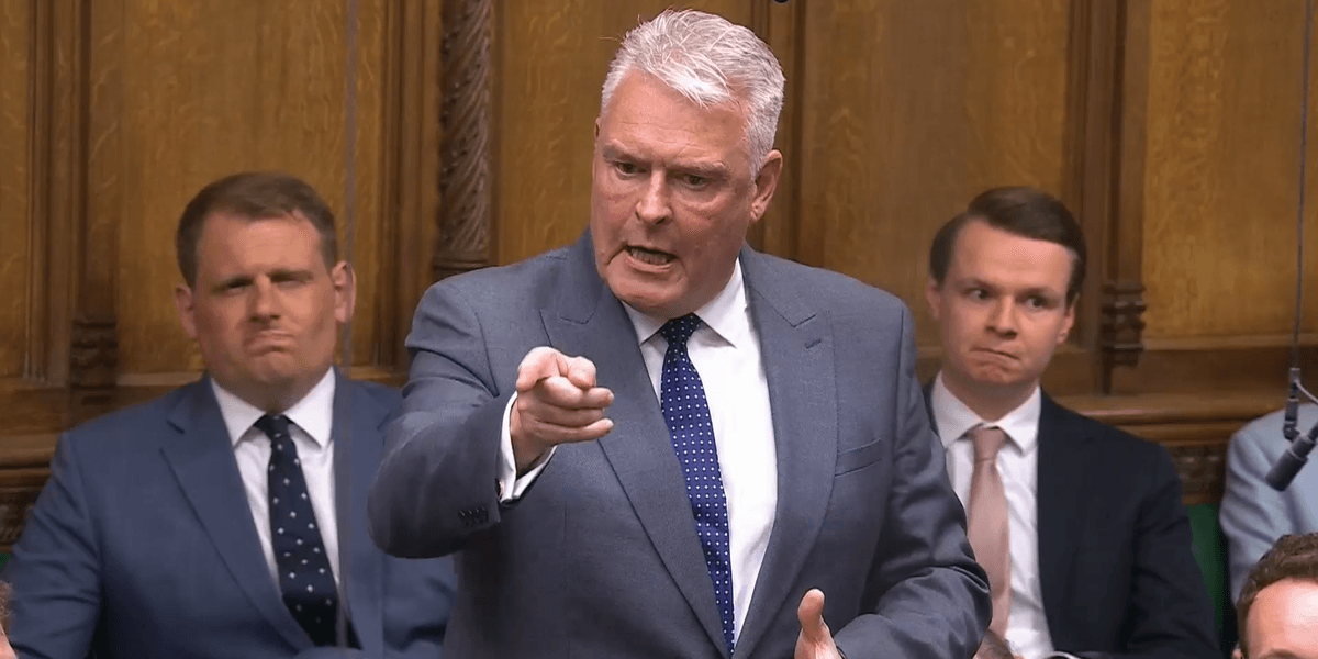 Lee Anderson reacting during political debate