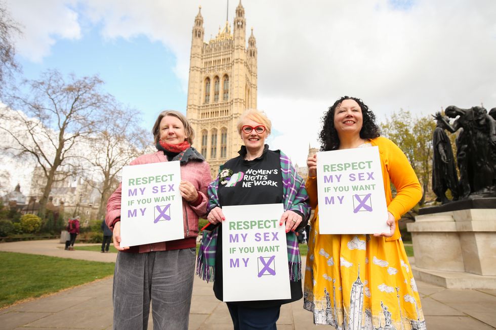 (Left-right) Caroline Ffiske of Women Uniting, Heather Binning from the Women's Rights Network and Maya Forstater Sex Matters in Victoria Tower Gardens, Westminster, as three of the country's largest campaign groups on women's rights - Women Uniting, Sex Matters and Women's Rights Network (WRN) - launch the 'Respect my Sex if you want my X' campaign, which is calling for as many members of public - female and male, and across all party lines - to quiz their politicians about their stance on women's rights and trans issues. Picture date: Saturday April 2, 2022.