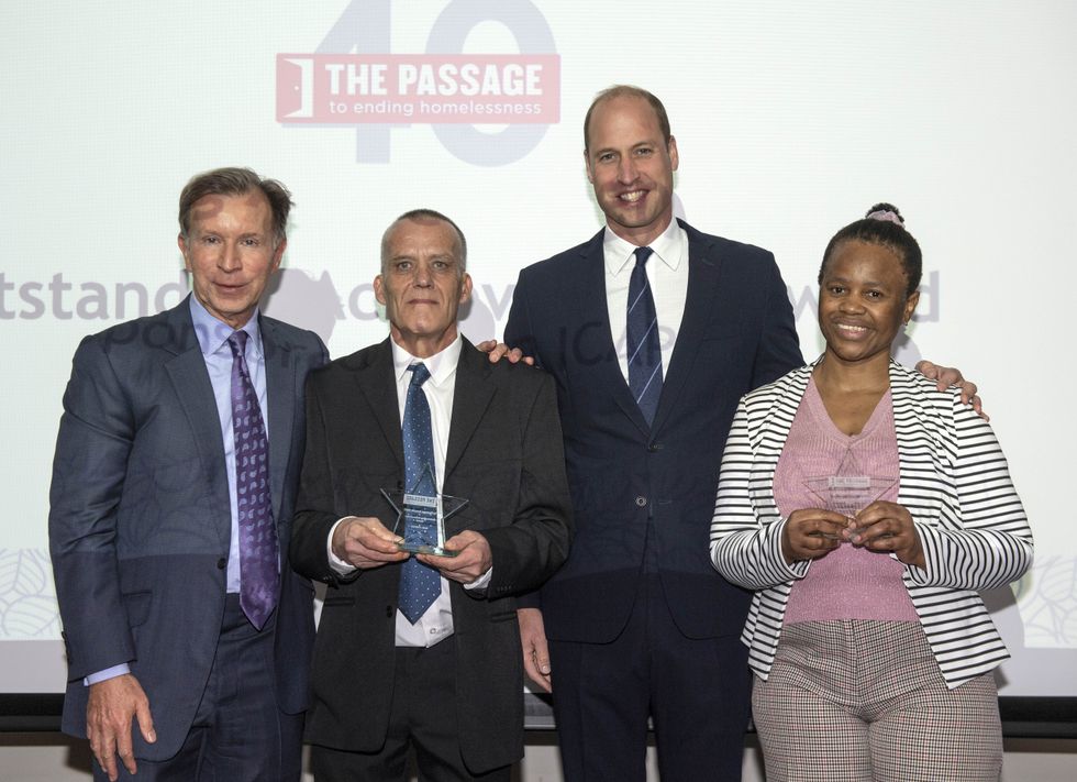 (Left-right) The Passage Ambassador John Studzinski, award winner Colin Chilman, the Duke of Cambridge, Royal Patron of The Passage and award winner Nomonde Mkhwanazi, during a visit to the charity's headquarters at the St Vincent's Centre, London, marking their 40th anniversary.